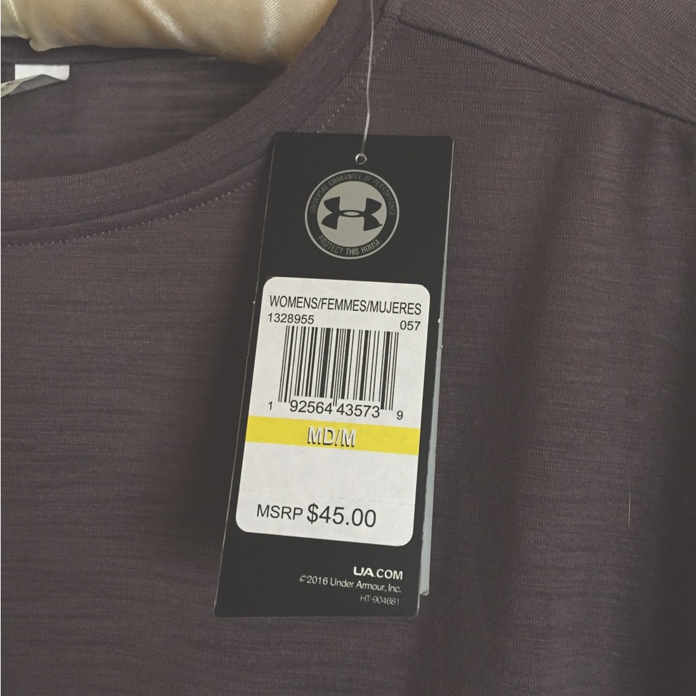Under Armour purple top. New, unworn, with tags. Size M.